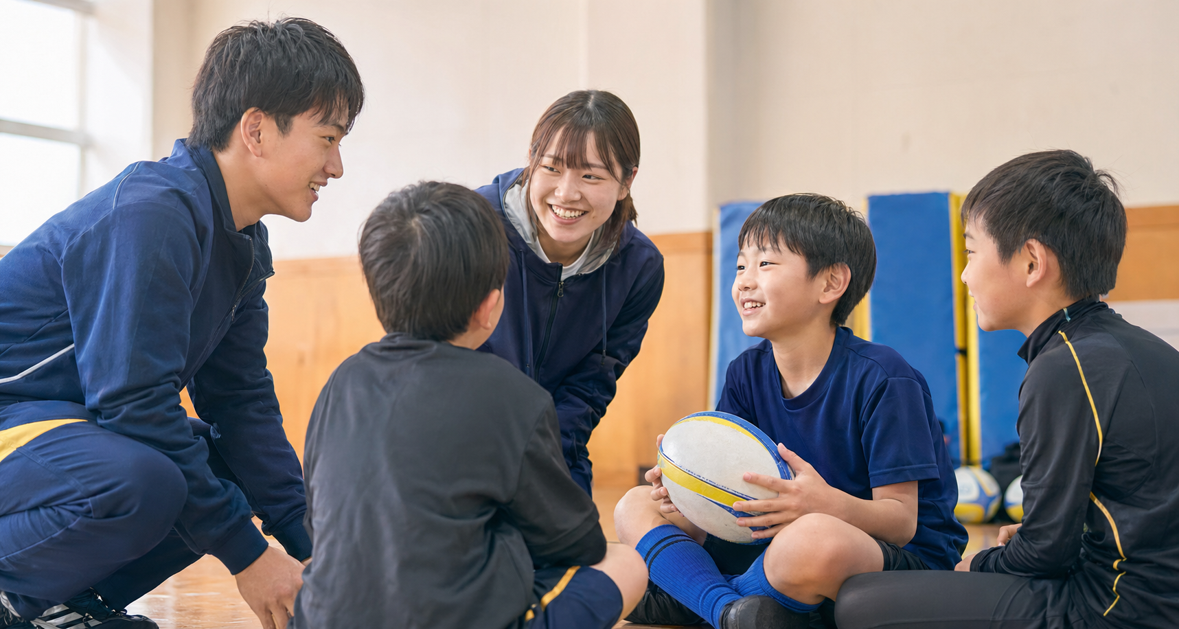 子どもたちと大学生ボランティアが交流している様子